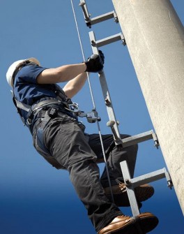 A person climbing a pole